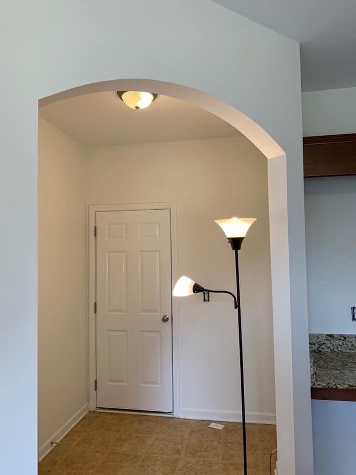 Finished hallway, warm light