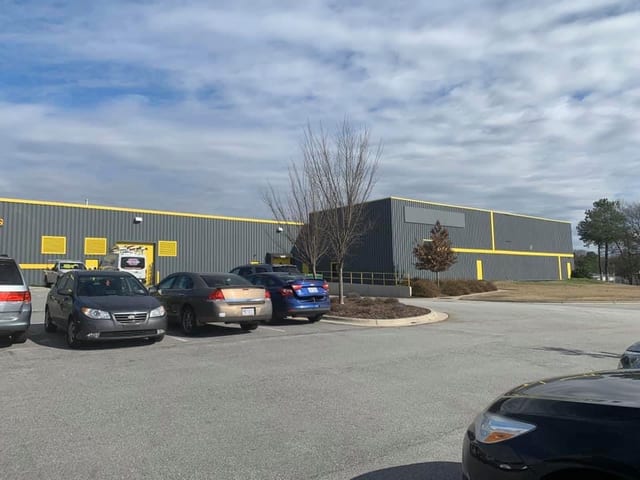 Parking lot and storefront